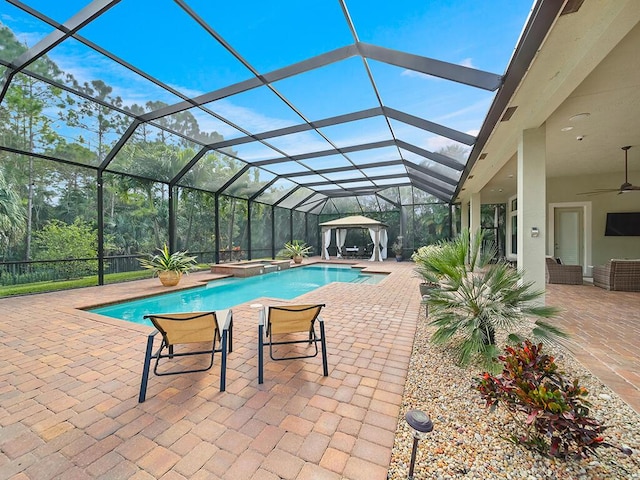 view of pool with a lanai, an outdoor living space, and a patio