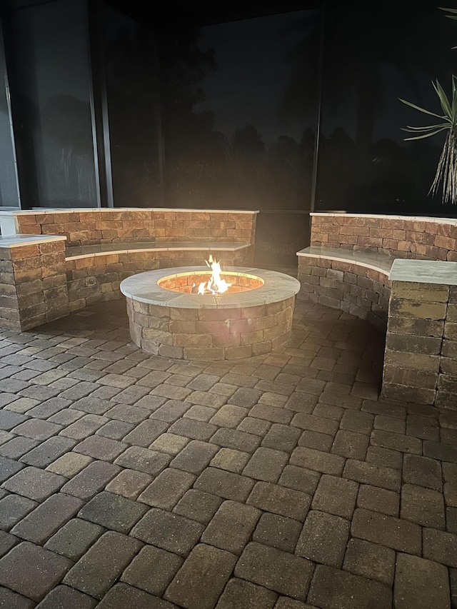 patio at twilight with a fire pit