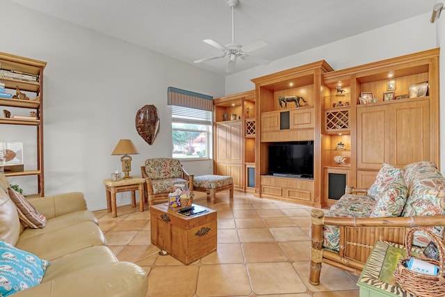 living room featuring ceiling fan and light tile patterned floors