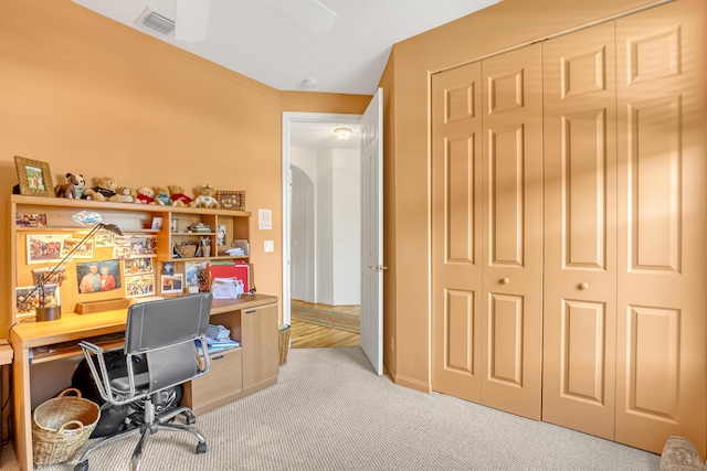 home office featuring light carpet