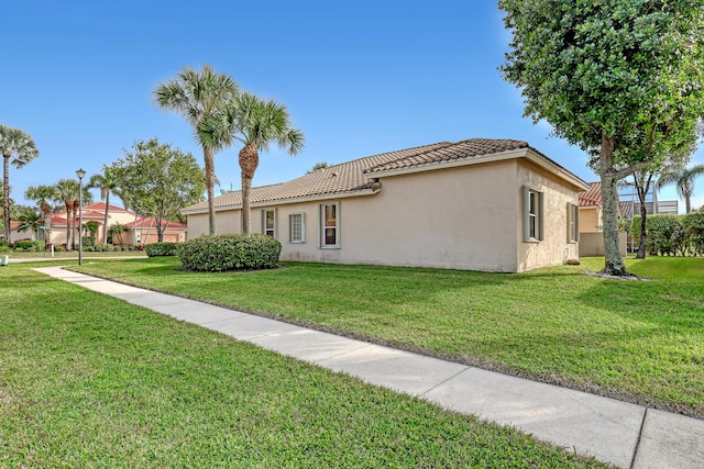 view of front of home with a front yard