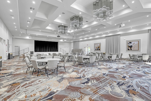 dining room with a towering ceiling