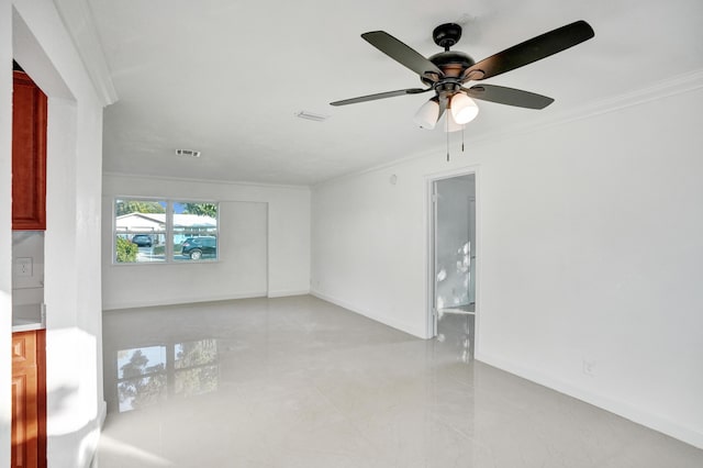 unfurnished living room with ceiling fan and crown molding