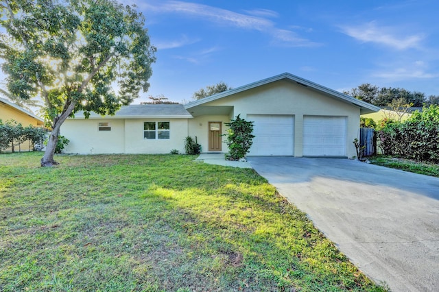 single story home with a front lawn and a garage