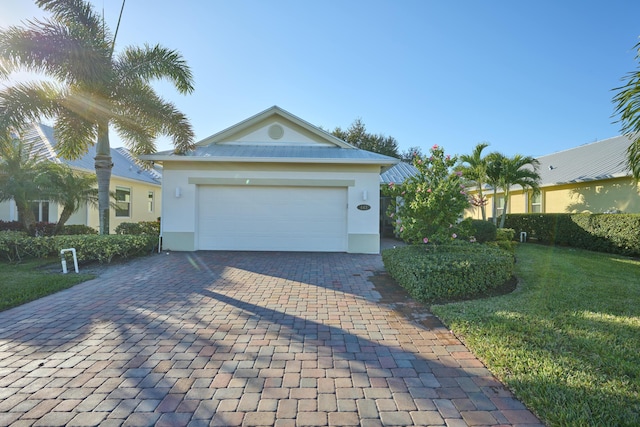 exterior space featuring decorative driveway