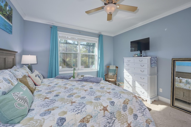 bedroom featuring carpet floors, crown molding, baseboards, and a ceiling fan