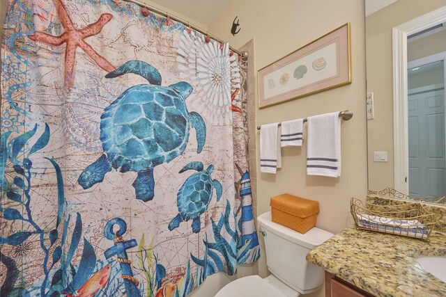 bathroom with a tile shower