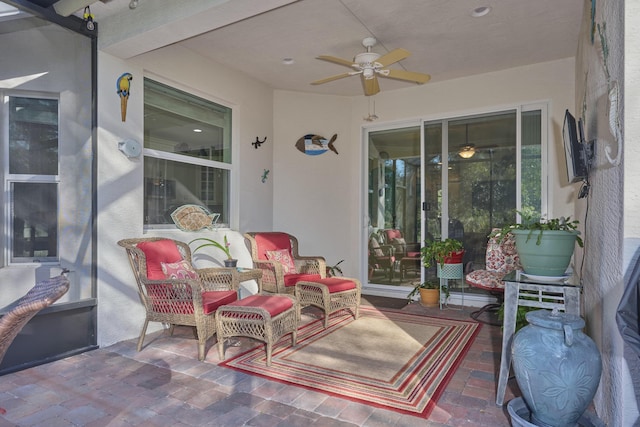 view of patio / terrace featuring an outdoor living space and a ceiling fan