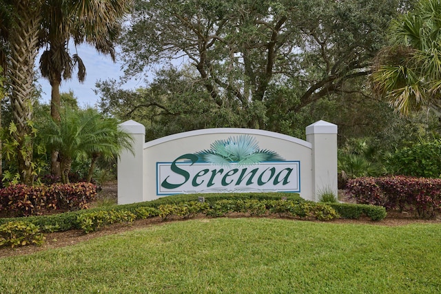 community sign with a yard