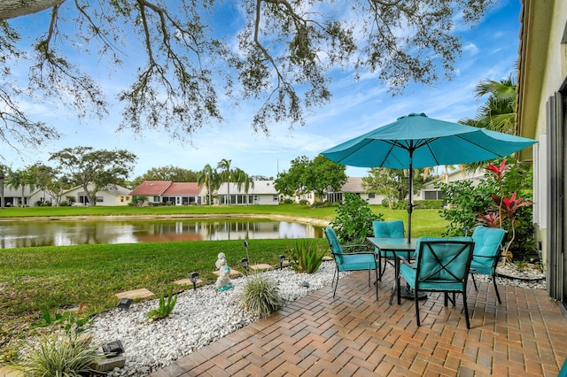 view of patio featuring a water view