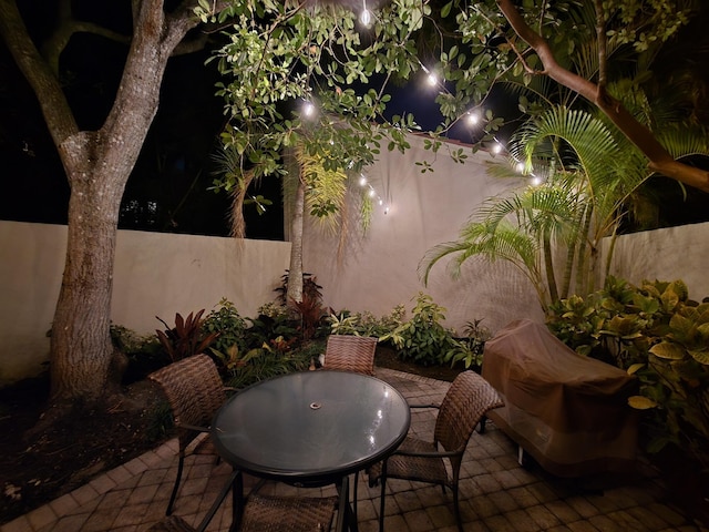 view of patio at night