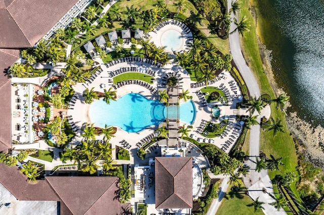 birds eye view of property with a water view