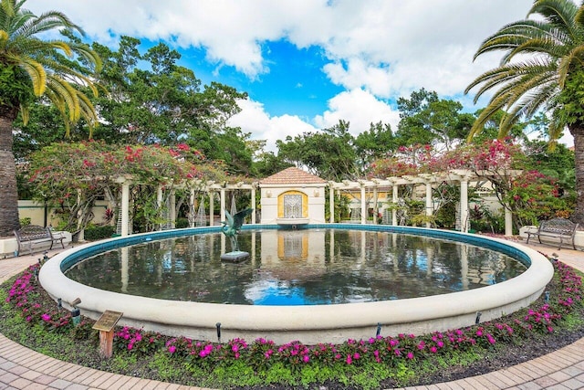 view of property's community with a pergola