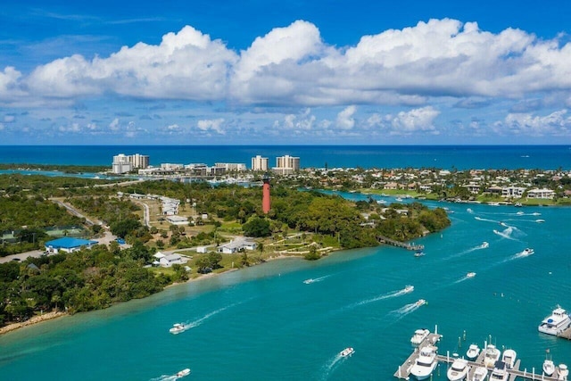 birds eye view of property featuring a water view