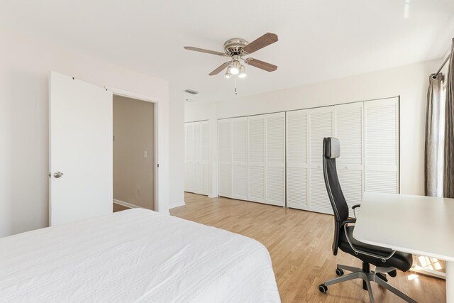 living room with a towering ceiling and light tile patterned floors