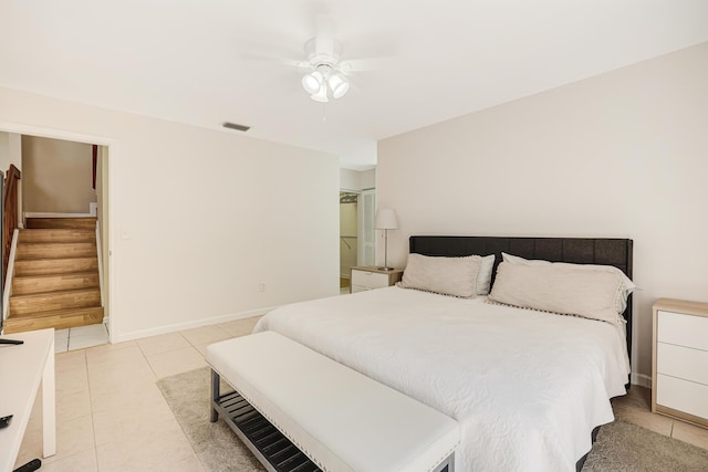 bedroom featuring ceiling fan and light tile patterned floors