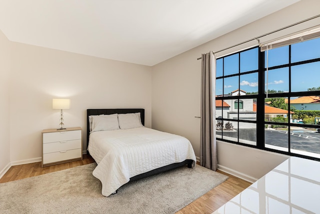 bedroom featuring light hardwood / wood-style flooring