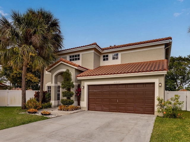 mediterranean / spanish-style house featuring a garage