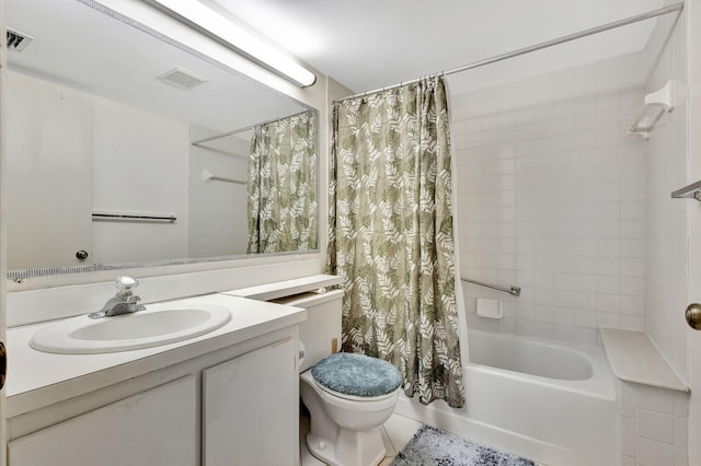 full bathroom featuring vanity, toilet, and shower / bath combo with shower curtain