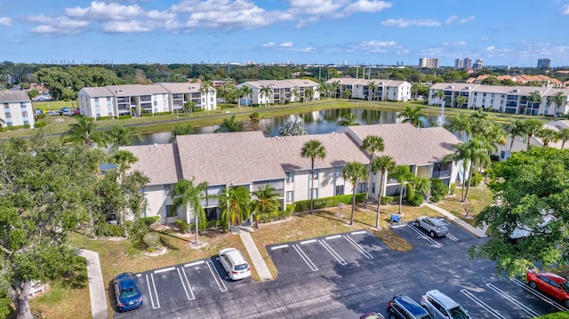 1102 Greenpine Blvd Unit A1, West Palm Beach, FL 33409 - aerial perspective of suburban area featuring a large body of water