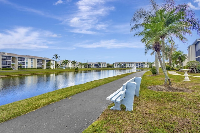 1102 Greenpine Blvd Unit A1, West Palm Beach, FL 33409 - view of home's community featuring a residential view, a water view, and a lawn