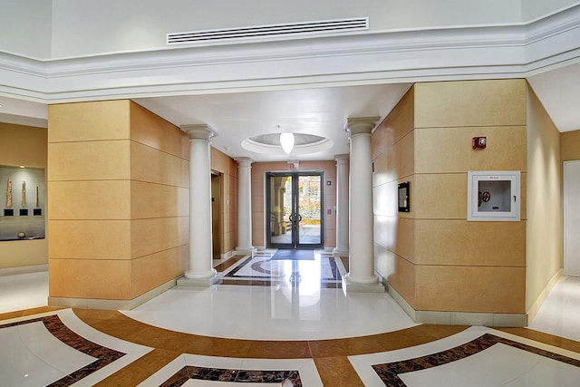 interior space featuring french doors and light tile patterned floors