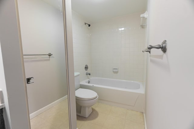 full bathroom with baseboards, toilet, and shower / washtub combination