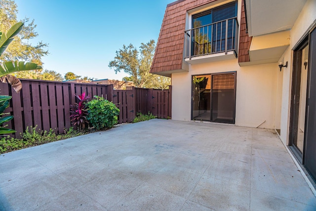 view of patio / terrace with a gate and fence