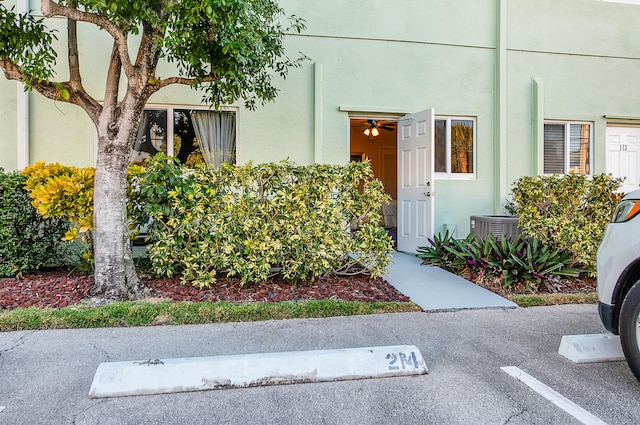 property entrance featuring central AC