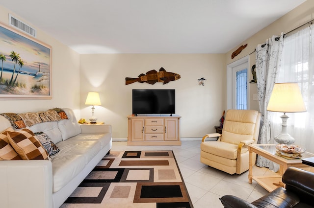 living room with light tile patterned floors