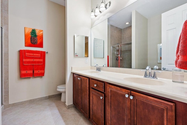 bathroom featuring walk in shower, tile patterned flooring, vanity, and toilet