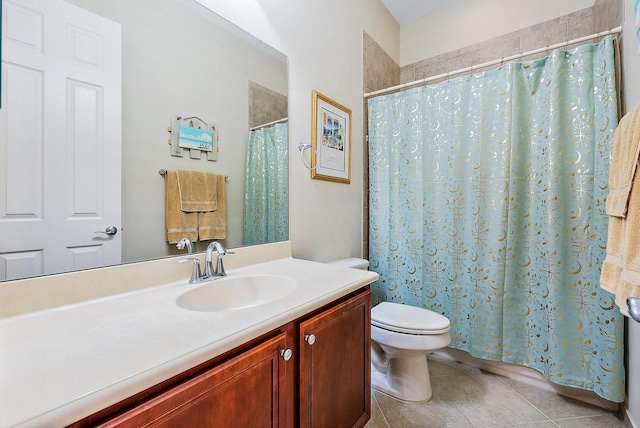 bathroom with vanity, a shower with shower curtain, and toilet