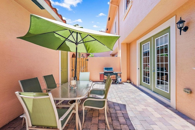 view of patio featuring french doors