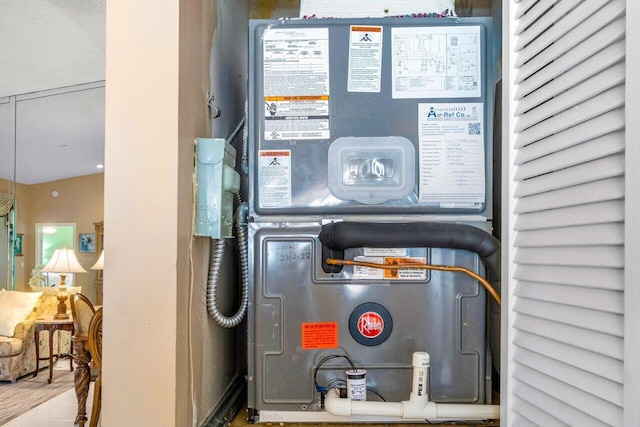 utility room featuring heating unit