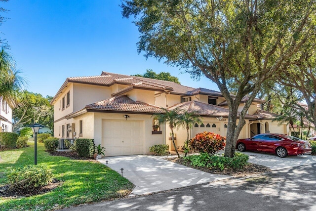 mediterranean / spanish-style house with a front lawn