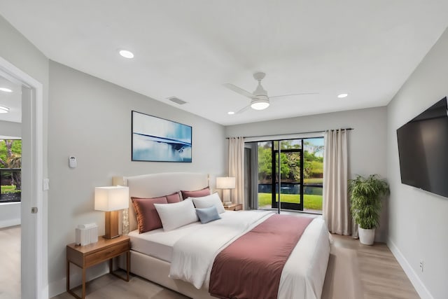 bedroom featuring ceiling fan and light hardwood / wood-style flooring