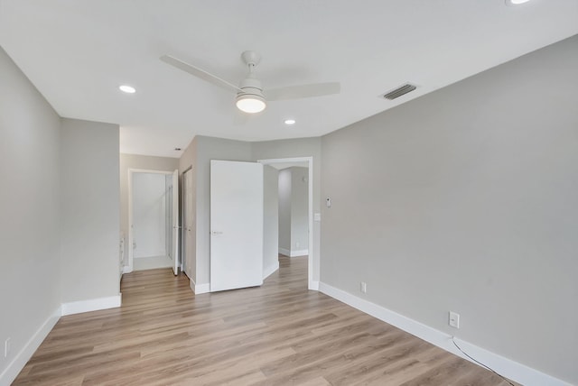 unfurnished bedroom featuring ceiling fan and light hardwood / wood-style flooring