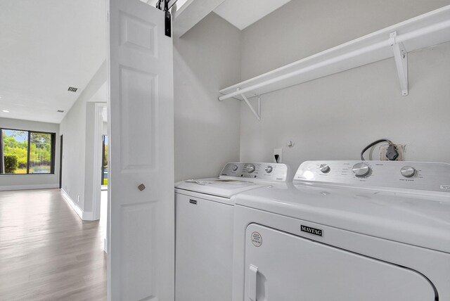 spare room with ceiling fan and light hardwood / wood-style floors