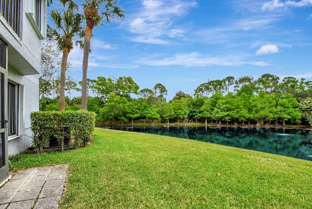 view of yard featuring a water view