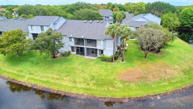 drone / aerial view with a water view