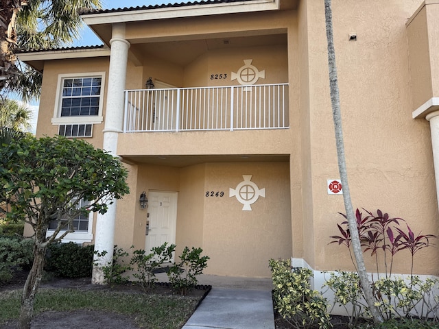 doorway to property with a balcony