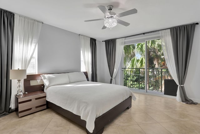 tiled bedroom featuring access to outside and ceiling fan