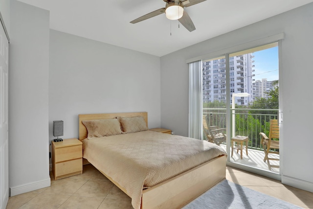 bedroom with ceiling fan, access to exterior, and light tile patterned floors