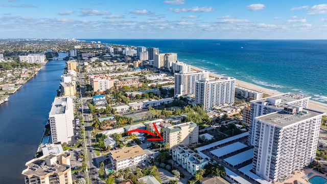 birds eye view of property featuring a water view