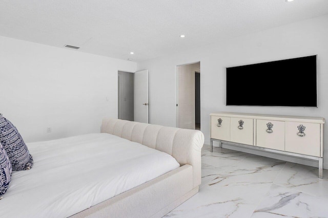 bedroom with a textured ceiling