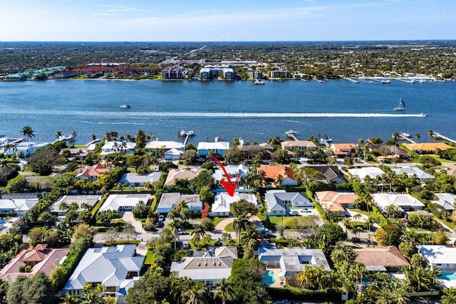 birds eye view of property featuring a water view