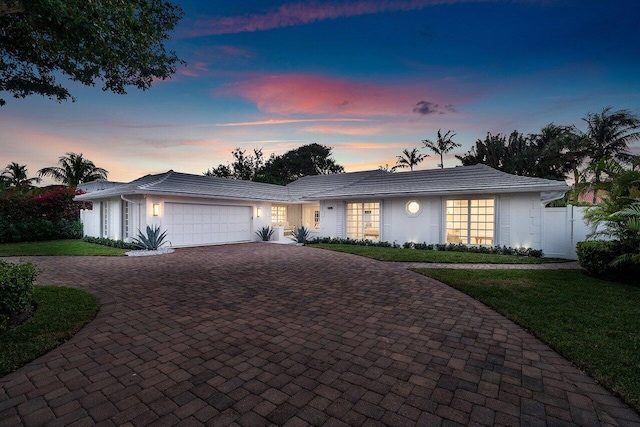 ranch-style home with a garage