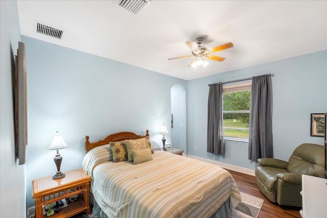 bedroom featuring ceiling fan and hardwood / wood-style flooring