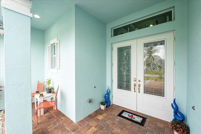 doorway to property featuring french doors