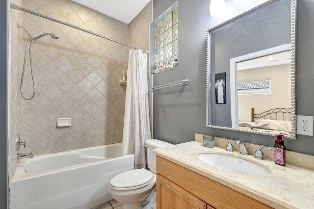 full bathroom with toilet, vanity, and shower / bath combo